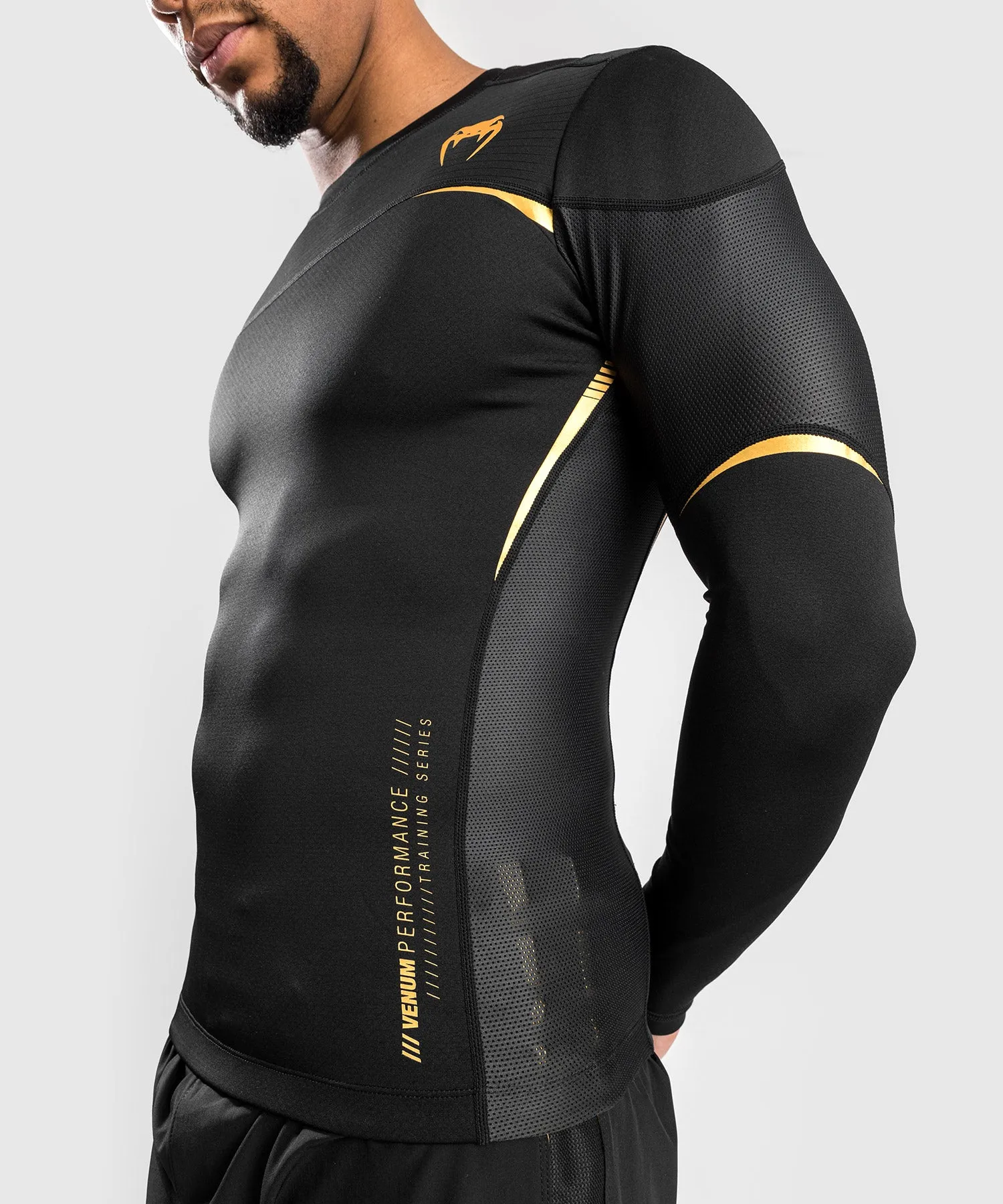 CAMISETA DE COMPRESIóN VENUM TEMPEST 2.0 (MANGA LARGA)  NEGRO/DORADO