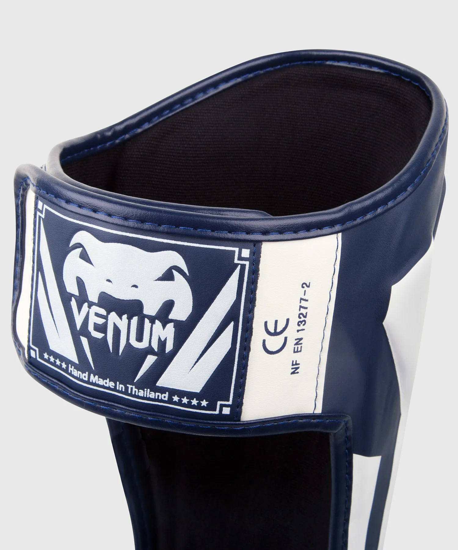 ESPINILLERAS VENUM ELITE STANDUP  BLANCO/AZUL MARINO