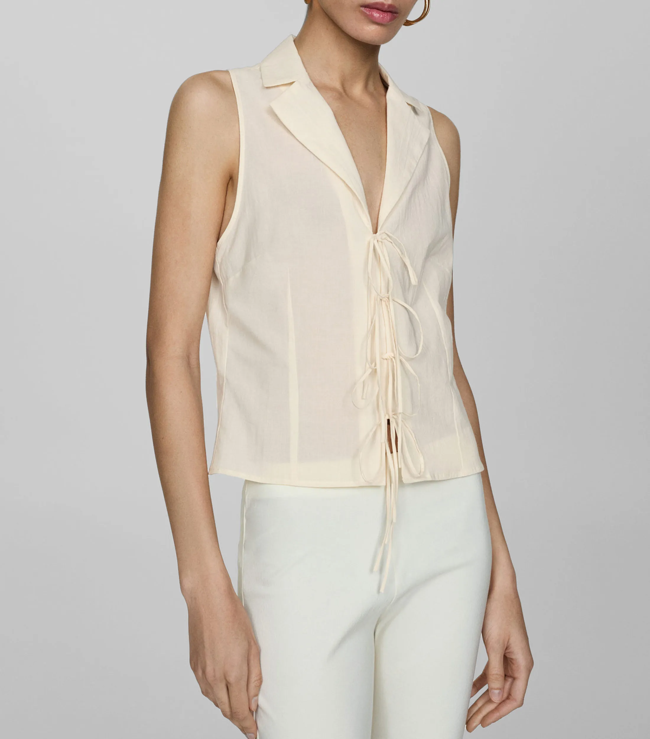 Mango Blusa lisa sin mangas Mujer