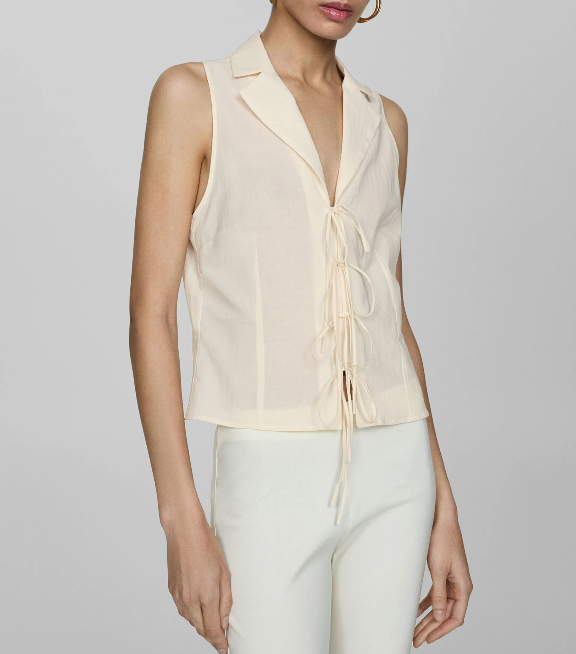 Mango Blusa lisa sin mangas Mujer