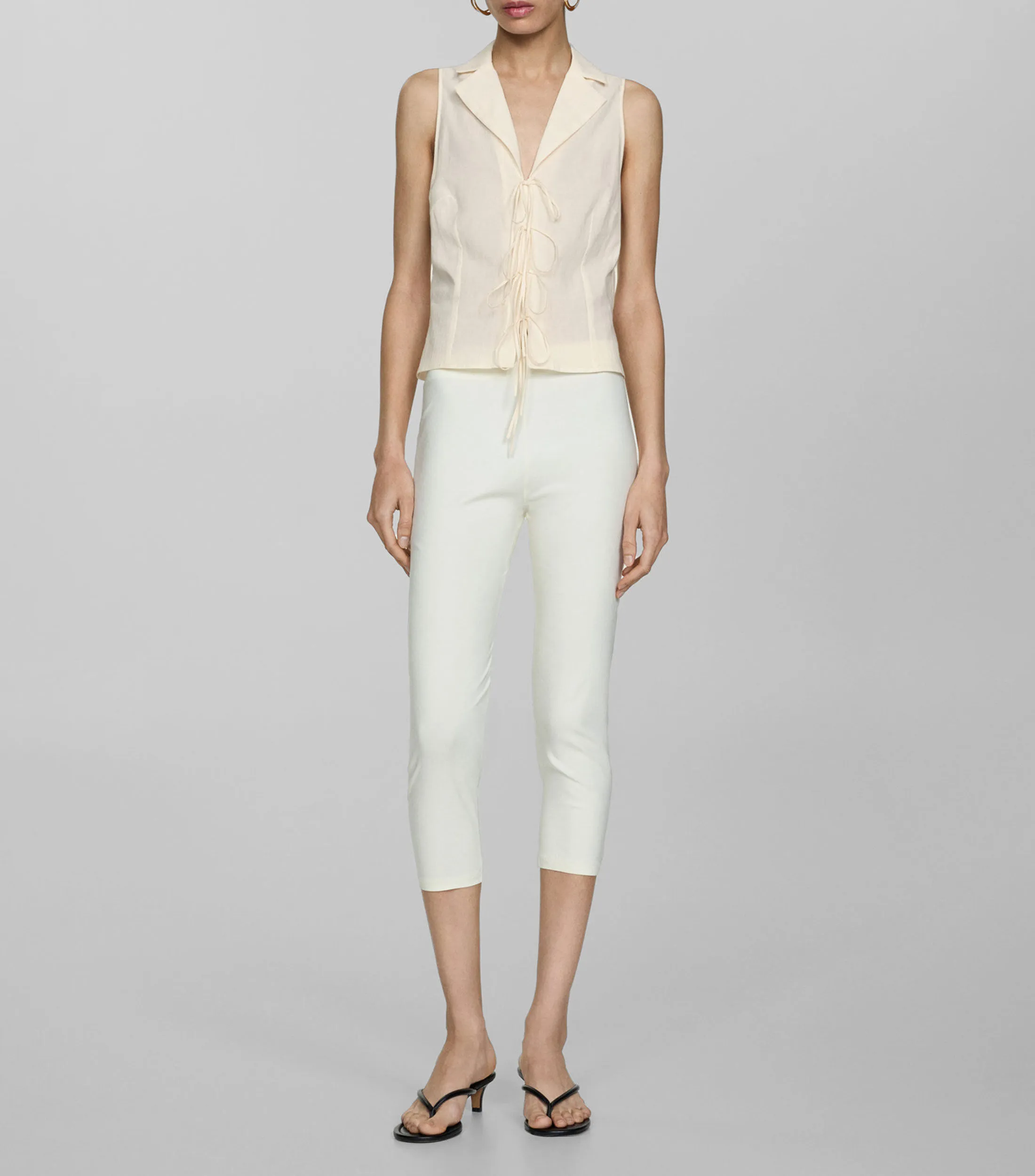 Mango Blusa lisa sin mangas Mujer