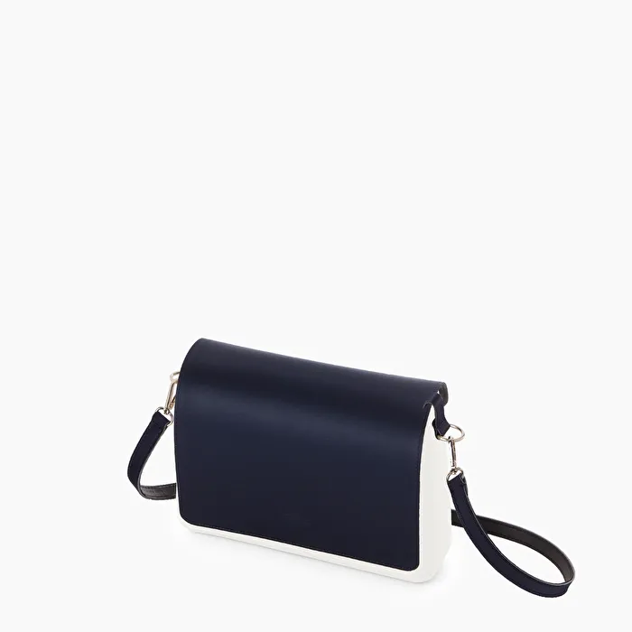 O bag glam leche y azul marino