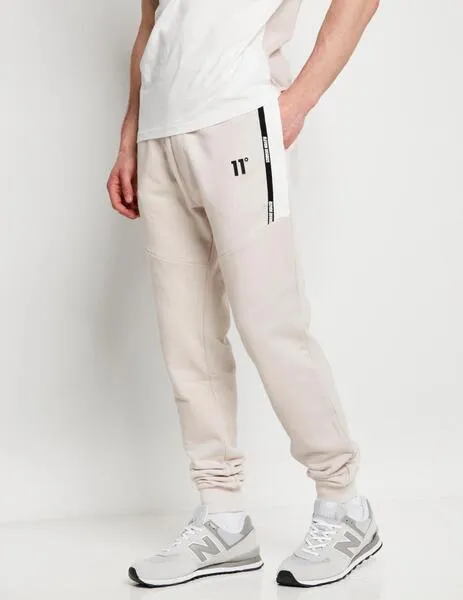 PANTALóN 11 DEGREES CUT & SEW TAPED JOGGERS  COCONUT/ STONE