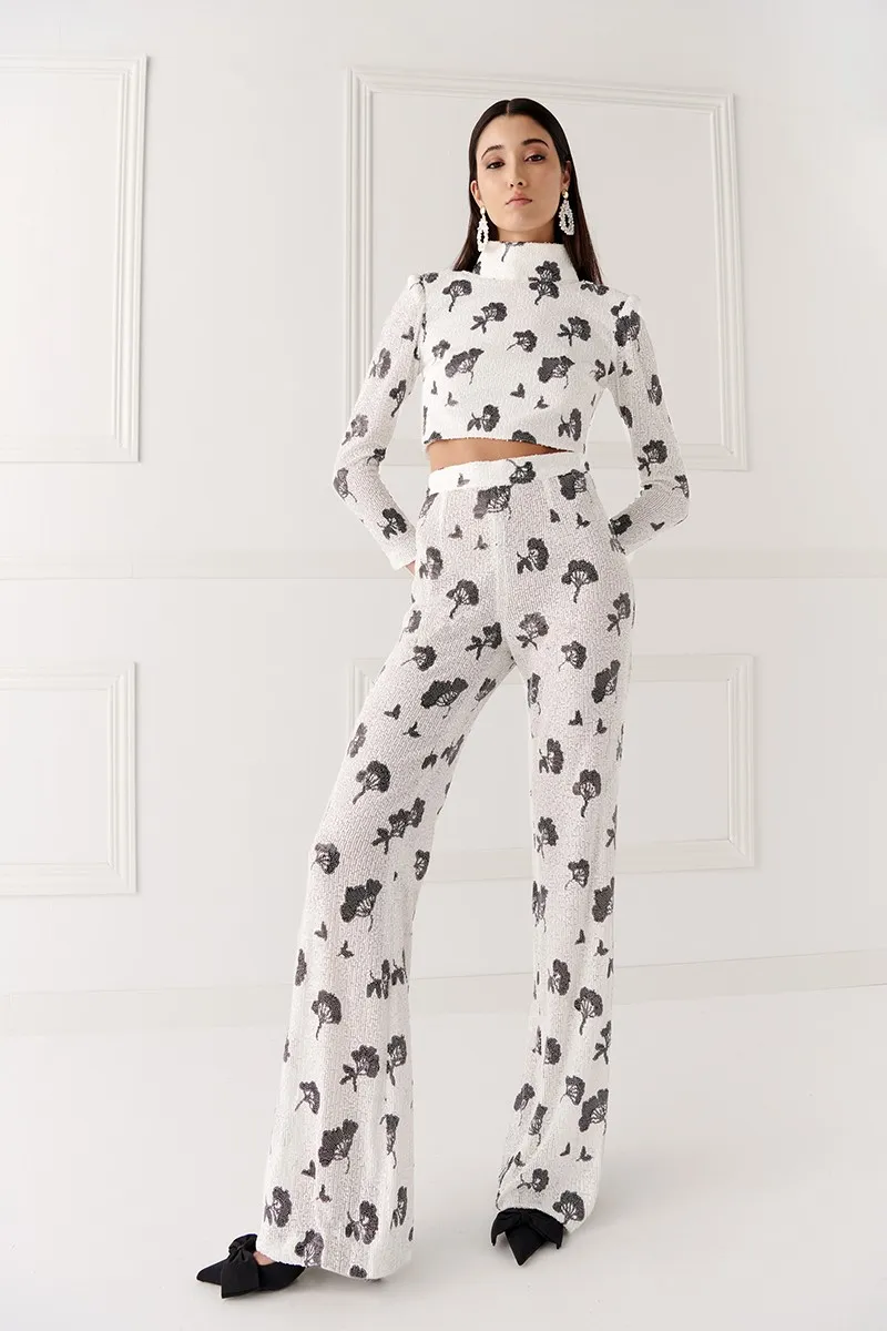 Top lentejuela blanca y negra manga y cuello subido Jackie